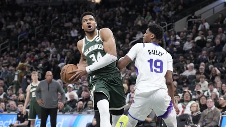 Mar 7, 2026; Milwaukee, Wisconsin, USA; Milwaukee Bucks forward Giannis Antetokounmpo (34) drives to the basket against Utah Jazz forward Ace Bailey (19) int the second half at Fiserv Forum. Mandatory Credit: Michael McLoone-Imagn Images