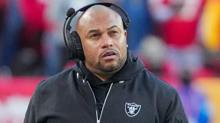 Nov 29, 2024; Kansas City, Missouri, USA; Las Vegas Raiders head coach Antonio Pierce watches play against the Kansas City Chiefs during the second half at GEHA Field at Arrowhead Stadium. Mandatory Credit: Denny Medley-Imagn Images