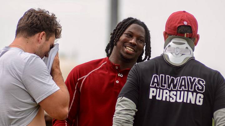 Oklahoma linebacker Kip Lewis talks to Owen Heinecke and Brent Venables during one of OU's elite prospect camps. Oklahoma linebacker Kip Lewis talks to Owen Heinecke and Brent Venables during one of OU's elite prospect camps.