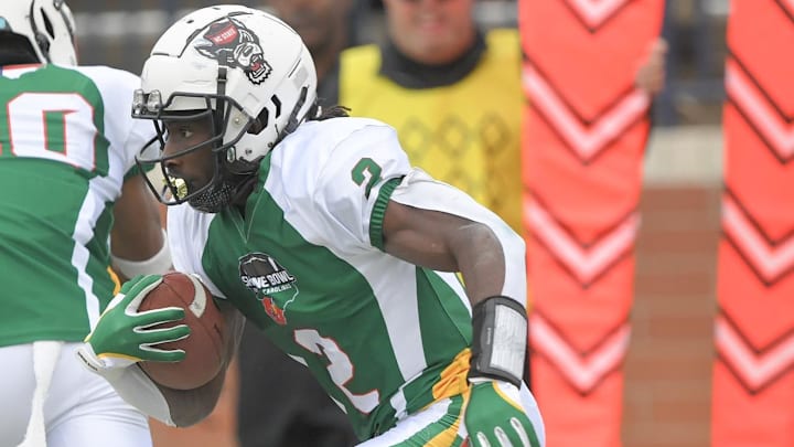 North Carolina receiver Jonathan Paylor of Hugh M. Cummings High, committed to NC State runs during the fourth quarter of the Shrine Bowl of the Carolinas football game at Viking Stadium in Spartanburg, S.C. Saturday, December 16, 2023. North Carolina receiver Jonathan Paylor of Hugh M. Cummings High, committed to NC State runs during the fourth quarter of the Shrine Bowl of the Carolinas football game at Viking Stadium in Spartanburg, S.C. Saturday, December 16, 2023.