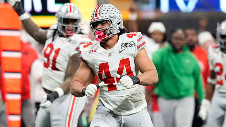 Ohio State Buckeyes defensive end JT Tuimoloau (44) celebrates a tackle against Notre Dame Fighting Irish in the second quarter during the College Football Playoff championship at Mercedes-Benz Stadium in Atlanta on January 20, 2025.