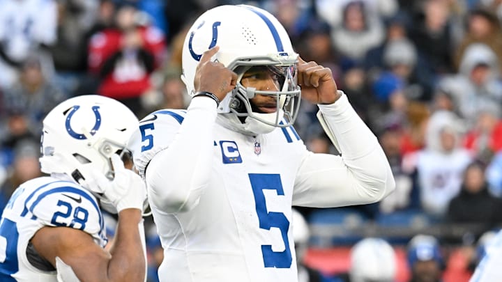 Dec 1, 2024; Foxborough, Massachusetts, USA; Indianapolis Colts quarterback Anthony Richardson (5) signals during the second half against the New England Patriots at Gillette Stadium. Mandatory Credit: Eric Canha-Imagn Images