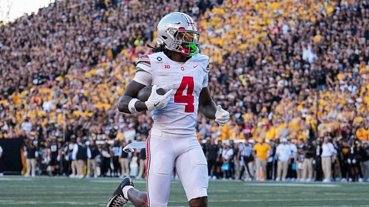 Ohio State wide receiver Jeremiah Smith scores a touchdown against Iowa. Ohio State wide receiver Jeremiah Smith scores a touchdown against Iowa.