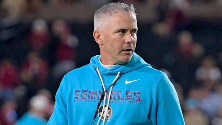 Nov 1, 2025; Tallahassee, Florida, USA; Florida State Seminoles head coach Mike Norvell walks on the field before the game against the Wake Forest Demon Deacons at Doak S. Campbell Stadium. Mandatory Credit: Melina Myers-Imagn Images