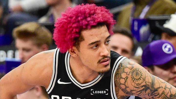 Jan 22, 2026; Salt Lake City, Utah, USA; San Antonio Spurs forward Jeremy Sochan (10) stretches before substituting in during the second half against the Utah Jazz at Delta Center. Mandatory Credit: Peter Creveling-Imagn Images