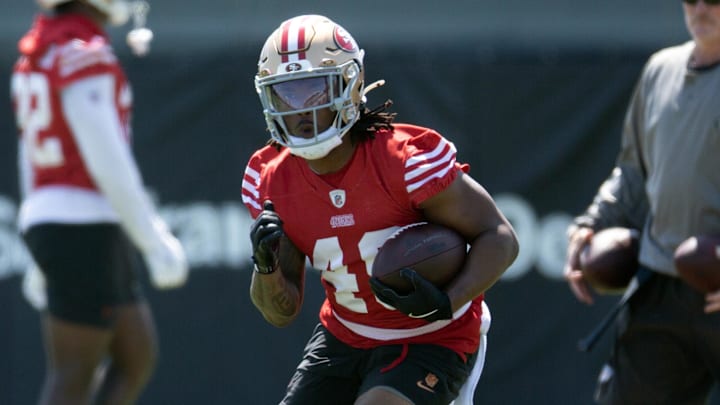 Jun 10, 2025; Santa Clara, CA, USA; San Francisco 49ers running back Corey Kiner (49) runs a play from scrimmage during an OTA at Levi's Stadium. Mandatory Credit: D. Ross Cameron-Imagn Images Jun 10, 2025; Santa Clara, CA, USA; San Francisco 49ers running back Corey Kiner (49) runs a play from scrimmage during an OTA at Levi's Stadium. Mandatory Credit: D. Ross Cameron-Imagn Images