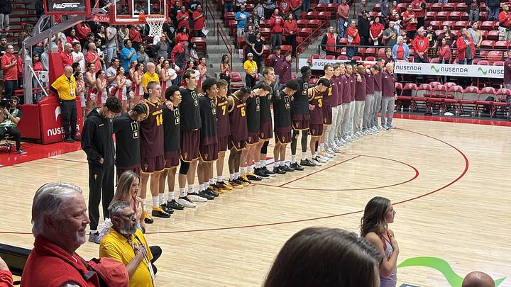 Arizona State lines up for the National Anthem before an exhibition meeting vs. the New Mexico Lobos.