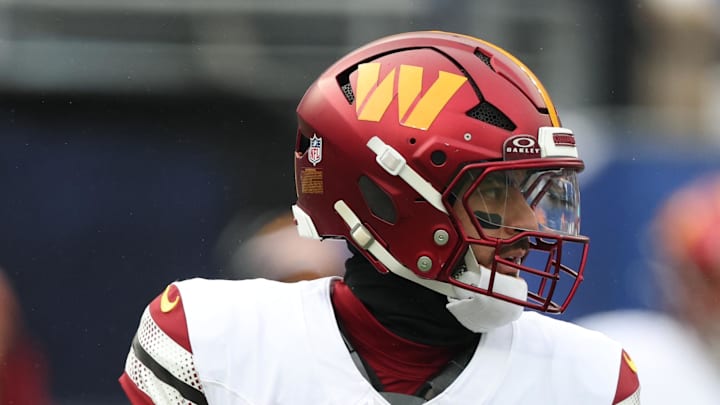 Washington Commanders quarterback Marcus Mariota looks to pass during the first quarter against the New York Giants.