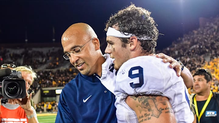 Sep 23, 2017; Iowa City, IA, USA; Penn State Nittany Lions head coach James Franklin celebrates with quarterback Trace McSorley (9) after the game against the Iowa Hawkeyes at Kinnick Stadium. Penn State won 21-19. Mandatory Credit: Jeffrey Becker-Imagn Images