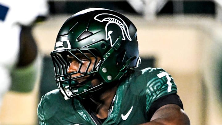 Michigan State's Brandon Tullis runs the ball against Michigan during the third quarter on Saturday, Oct. 25, 2025, at Spartan Stadium in East Lansing. Michigan State's Brandon Tullis runs the ball against Michigan during the third quarter on Saturday, Oct. 25, 2025, at Spartan Stadium in East Lansing.
