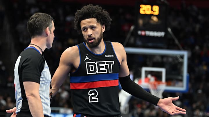 Dec 3, 2024; Detroit, Michigan, USA; Detroit Pistons guard Cade Cunningham (2) talks with the referee during a break in the action against the Milwaukee Bucks in the second quarter at Little Caesars Arena. Mandatory Credit: Lon Horwedel-Imagn Images