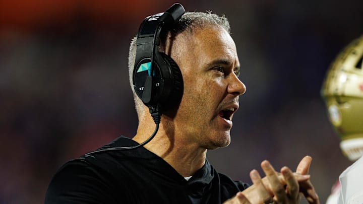 Nov 29, 2025; Gainesville, Florida, USA; Florida State Seminoles head coach Mike Norvell gestures against the Florida Gators during the second half at Ben Hill Griffin Stadium. Mandatory Credit: Matt Pendleton-Imagn Images
