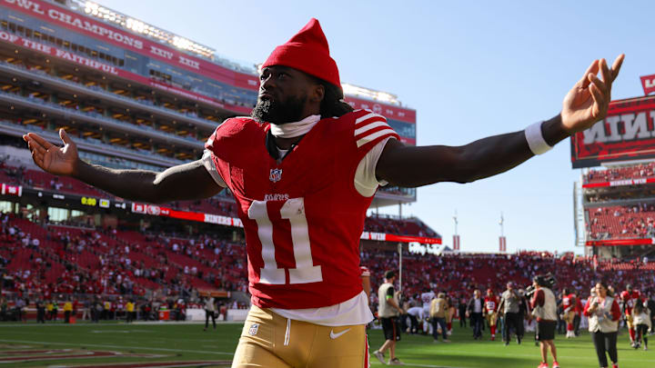 Oct 1, 2023; Santa Clara, California, USA; San Francisco 49ers wide receiver Brandon Aiyuk (11) celebrates after the game against the Arizona Cardinals at Levi's Stadium. Mandatory Credit: Sergio Estrada-Imagn Images