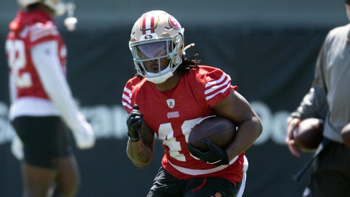 Jun 10, 2025; Santa Clara, CA, USA; San Francisco 49ers running back Corey Kiner (49) runs a play from scrimmage during an OTA at Levi's Stadium. Mandatory Credit: D. Ross Cameron-Imagn Images