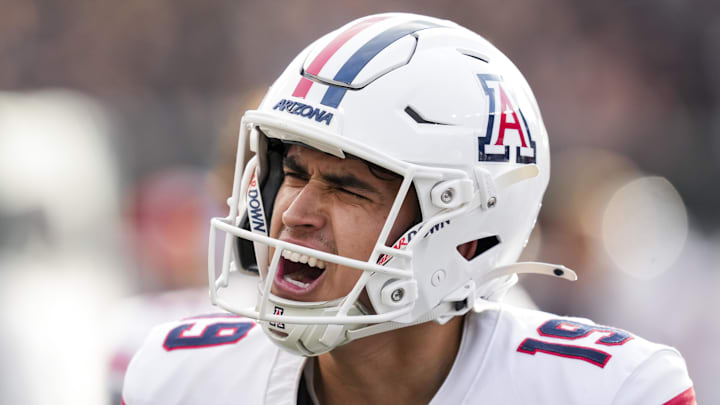 Nov 15, 2025; Cincinnati, Ohio, USA;  Arizona Wildcats kicker Michael Salgado-Medina (19) reacts on the sideline after kicking a field goal against the Cincinnati Bearcats in the second half at Nippert Stadium. Mandatory Credit: Aaron Doster-Imagn Images
