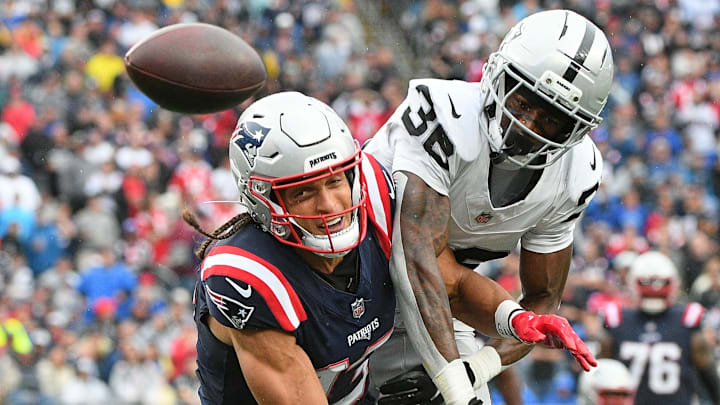 Sep 7, 2025; Foxborough, Massachusetts, USA; New England Patriots wide receiver Jalen Hurd (13) attempts to make a catch against Las Vegas Raiders cornerback Kyu Blu Kelly (36) during the first half at Gillette Stadium. Mandatory Credit: Bob DeChiara-Imagn Images