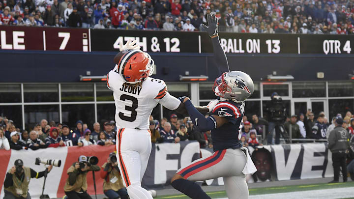 Oct 26, 2025; Foxborough, Massachusetts, USA;  Cleveland Browns wide receiver Jerry Jeudy (3) reaches for a pass against New England Patriots cornerback Christian Gonzalez (0) during the fourth quarter at Gillette Stadium. Mandatory Credit: Bob DeChiara-Imagn Images