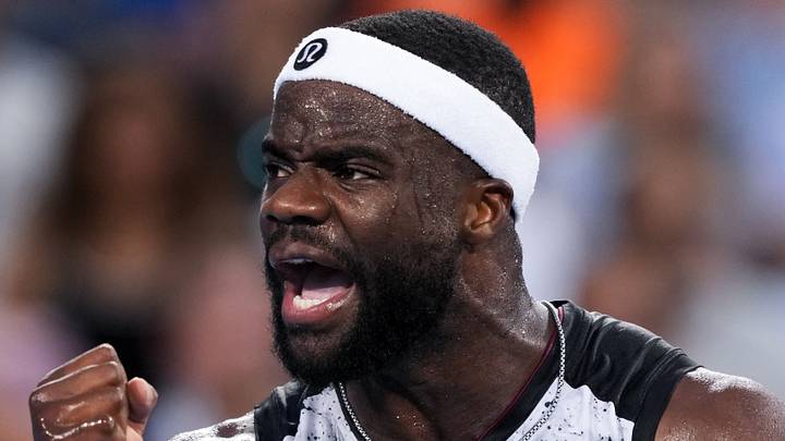 Frances Tiafoe reacts after returning a shot Frances Tiafoe reacts after returning a shot