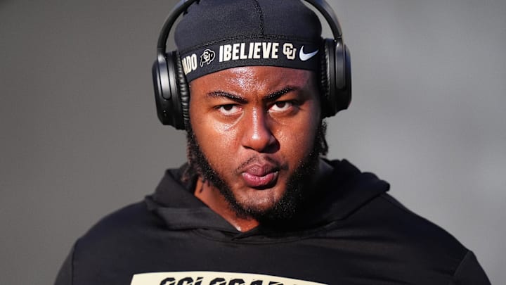 Nov 16, 2024; Boulder, Colorado, USA; Colorado Buffaloes offensive tackle Jordan Seaton (77) before the game against the Utah Utes at Folsom Field. Mandatory Credit: Ron Chenoy-Imagn Images