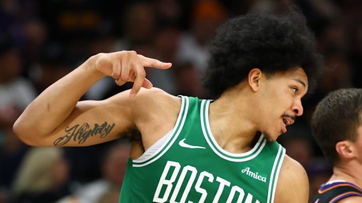 Feb 24, 2026; Phoenix, Arizona, USA; Boston Celtics guard Ron Harper Jr. (13) celebrates a three point shot alongside Phoenix Suns guard Collin Gillespie in the second half at Mortgage Matchup Center. Mandatory Credit: Mark J. Rebilas-Imagn Images Feb 24, 2026; Phoenix, Arizona, USA; Boston Celtics guard Ron Harper Jr. (13) celebrates a three point shot alongside Phoenix Suns guard Collin Gillespie in the second half at Mortgage Matchup Center. Mandatory Credit: Mark J. Rebilas-Imagn Images