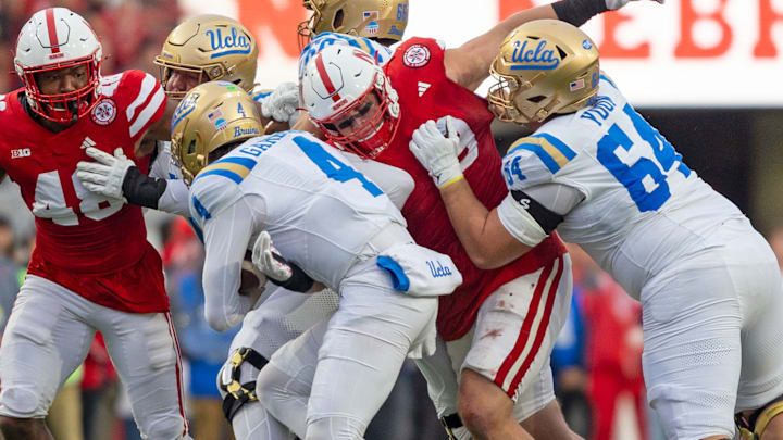 Nebraska defensive lineman Ty Robinson sacks UCLA quarterback Ethan Garbers for an 8-yard loss during the third quarter.