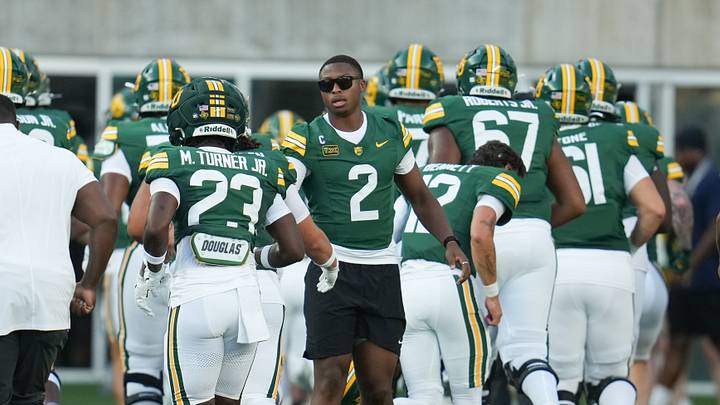 Sep 12, 2026; Waco, Texas, USA; Baylor Bears quarterback DJ Lagway (2) in street clothes during warmups with teammates before the game against the Prairie View A&M Panthers at McLane Stadium. Mandatory Credit: Chris Jones-Imagn Images Sep 12, 2026; Waco, Texas, USA; Baylor Bears quarterback DJ Lagway (2) in street clothes during warmups with teammates before the game against the Prairie View A&M Panthers at McLane Stadium. Mandatory Credit: Chris Jones-Imagn Images