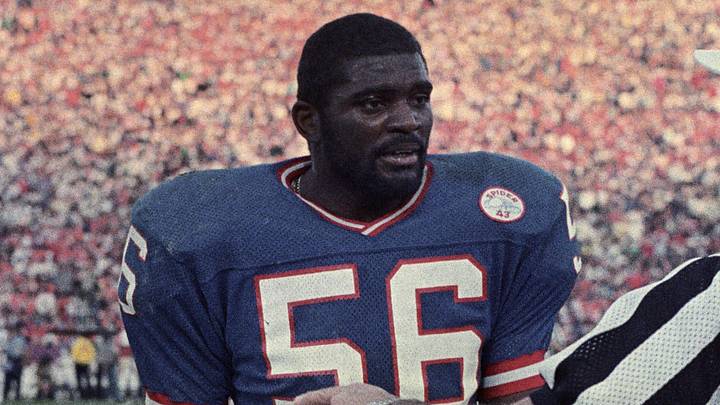 Jan 25, 1987; Pasadena, CA, USA; FILE PHOTO; New York Giants linebacker Lawrence Taylor (56) talks with NFL official Hendi Ancich (115) on the sideline during Super Bowl XXI against the Denver Broncos at the Rose Bowl. The Giants defeated the Broncos 39-20. Jan 25, 1987; Pasadena, CA, USA; FILE PHOTO; New York Giants linebacker Lawrence Taylor (56) talks with NFL official Hendi Ancich (115) on the sideline during Super Bowl XXI against the Denver Broncos at the Rose Bowl. The Giants defeated the Broncos 39-20.