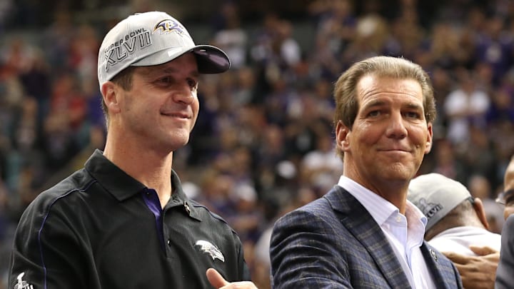 Feb 3, 2013; New Orleans, LA, USA; Baltimore Ravens owner Steve Bisciotti (right) and head coach John Harbaugh celebrate after defeating the San Francisco 49ers 34-31 in Super Bowl XLVII at the Mercedes-Benz Superdome. Mandatory Credit: Matthew Emmons-Imagn Images