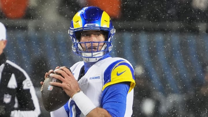 Jan 18, 2026; Chicago, IL, USA; Los Angeles Rams quarterback Matthew Stafford (9) looks to throw a pass against the Chicago Bears during the first quarter of an NFC Divisional Round game at Soldier Field. Mandatory Credit: David Banks-Imagn Images