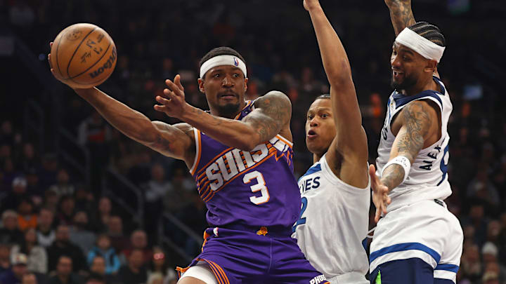 Jan 29, 2025; Phoenix, Arizona, USA; Phoenix Suns guard Bradley Beal (3) makes a pass against Minnesota Timberwolves guard Nickeil Alexander-Walker (9) in the second half at Footprint Center. Jan 29, 2025; Phoenix, Arizona, USA; Phoenix Suns guard Bradley Beal (3) makes a pass against Minnesota Timberwolves guard Nickeil Alexander-Walker (9) in the second half at Footprint Center.