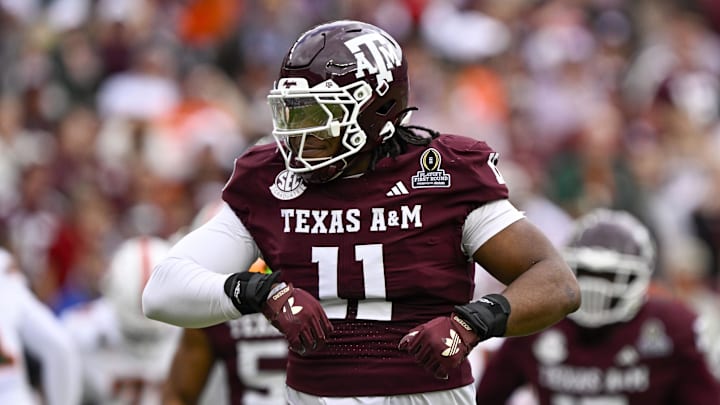 Texas A&M Aggies defensive tackle Tyler Onyedim celebrates during the game between the Aggies and the Hurricanes at Kyle Field. 
