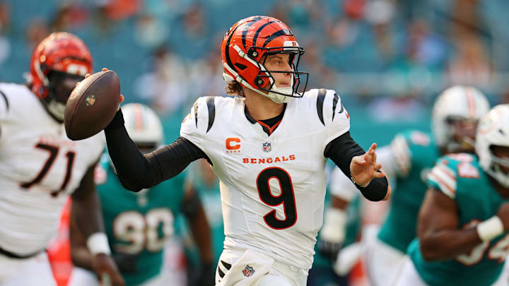 Dec 21, 2025; Miami Gardens, Florida, USA; Cincinnati Bengals quarterback Joe Burrow (9) runs the ball during the first quarter against the Cincinnati Bengals at Hard Rock Stadium. Mandatory Credit: Nathan Ray Seebeck-Imagn Images