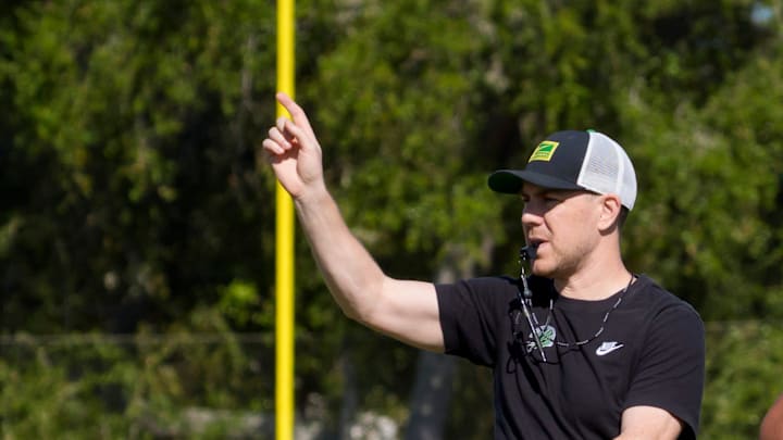 Oregon offensive coordinator Will Stein walks the field as the Oregon Ducks practice at Barry University ahead of the Orange Bowl on Dec. 30, 2025, in Miami, Florida. Oregon offensive coordinator Will Stein walks the field as the Oregon Ducks practice at Barry University ahead of the Orange Bowl on Dec. 30, 2025, in Miami, Florida.