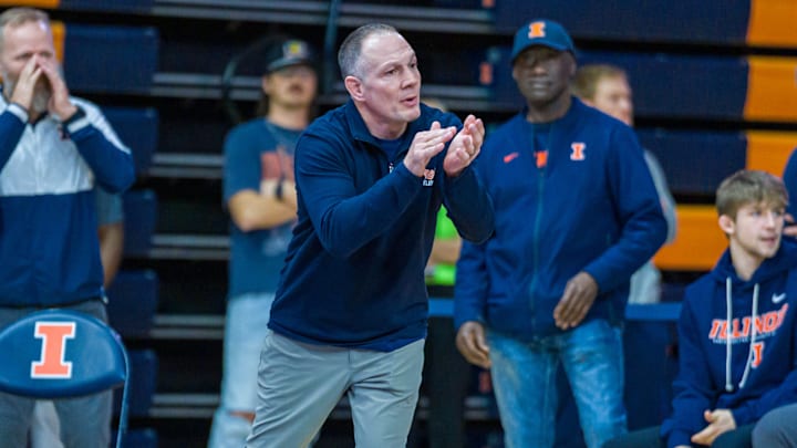 Jeremy Hunter was named Illinois wrestling's permanent head coach on Thursday after serving 25 years as an assistant for the program and assuming the role of acting head coach in December.