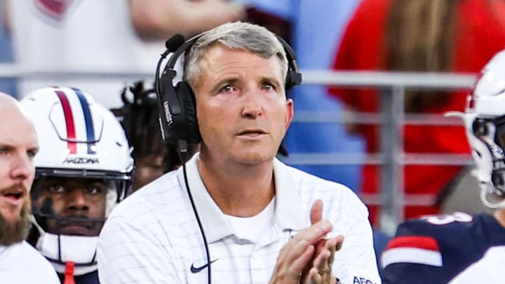 Sep 12, 2025; Tucson, Arizona, USA; Arizona Wildcats head coach Brent Brennan hypes up his team during the first quarter of the game against the Kansas State Wildcats at Arizona Stadium. Mandatory Credit: Aryanna Frank-Imagn Images