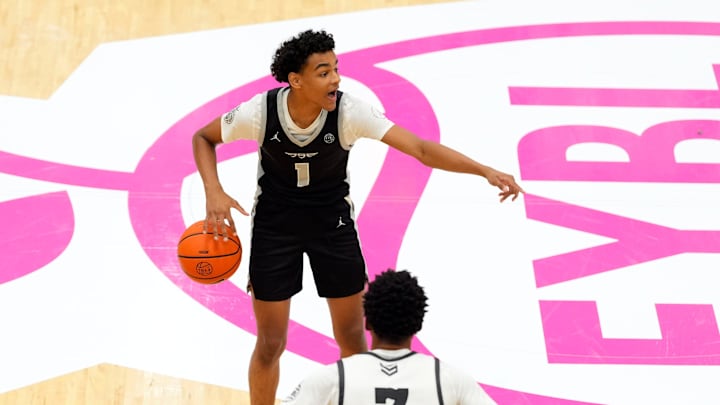 July 19, 2025; North Augusta, South Carolina, USA; Brad Beal Elite Quentin Coleman (1) gestures to a teammate as Team Durant Evans Barning Jr. (7) defends during the Brad Beal Elite and Team Durant game at the Nike EYBL Peach Jam at Riverview Park Activity Center. Brad Beal Elite won 91-59. Mandatory Credit: Katie Goodale - Augusta Chronicle/USA TODAY NETWORK