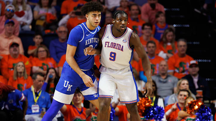 Feb 14, 2026; Gainesville, Florida, USA; Florida Gators center Rueben Chinyelu (9) posts up against Kentucky Wildcats center Malachi Moreno (24) during the first half at Exactech Arena at the Stephen C. O'Connell Center. Mandatory Credit: Matt Pendleton-Imagn Images