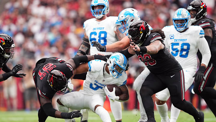 Arizona Cardinals defensive tackle Roy Lopez (98) tackle Detroit Lions running back David Montgomery (5) 