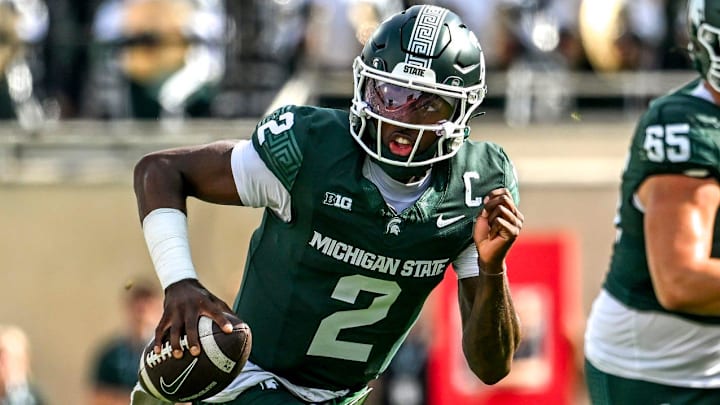 Michigan State's quarterback Aiden Chiles runs for a gain against Youngstown State during the first quarter on Saturday, Sept. 13, 2025, at Spartan Stadium in East Lansing. Michigan State's quarterback Aiden Chiles runs for a gain against Youngstown State during the first quarter on Saturday, Sept. 13, 2025, at Spartan Stadium in East Lansing.