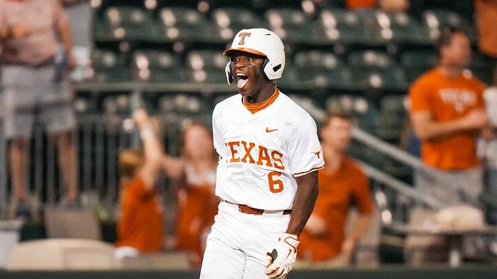 Texas Longhorns' outfielder Anthony Pack Jr. celebrates a grand slam against the USC Upstate Spartans.