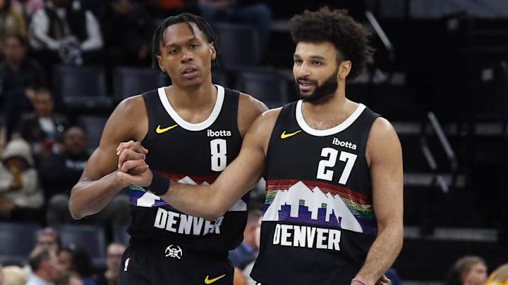 Nov 24, 2025; Memphis, Tennessee, USA; Denver Nuggets guard Peyton Watson (8) reacts with guard Jamal Murray (27) during the fourth quarter against the Memphis Grizzlies at FedExForum.