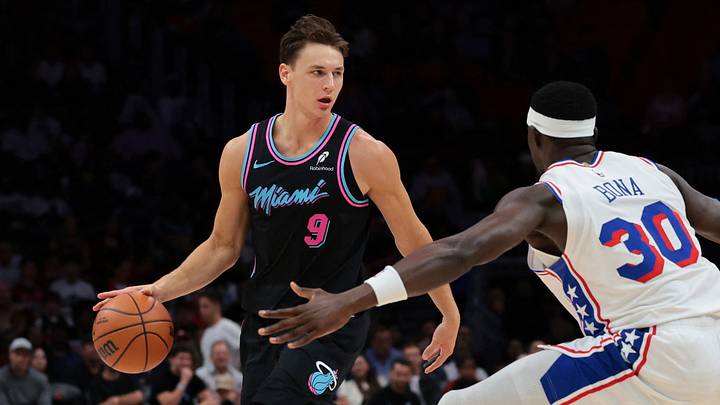Mar 30, 2026; Miami, Florida, USA; Miami Heat guard Pelle Larsson (9) dribbles the basketball as Philadelphia 76ers center Adem Bona (30) defends during the second quarter at Kaseya Center. Mandatory Credit: Sam Navarro-Imagn Images Mar 30, 2026; Miami, Florida, USA; Miami Heat guard Pelle Larsson (9) dribbles the basketball as Philadelphia 76ers center Adem Bona (30) defends during the second quarter at Kaseya Center. Mandatory Credit: Sam Navarro-Imagn Images