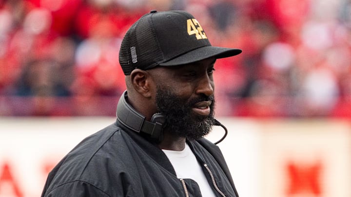 Nov 2, 2024; Lincoln, Nebraska, USA; UCLA Bruins head coach DeShaun Foster walks off after a timeout in the second quarter against the Nebraska Cornhuskers at Memorial Stadium. Mandatory Credit: Dylan Widger-Imagn Images