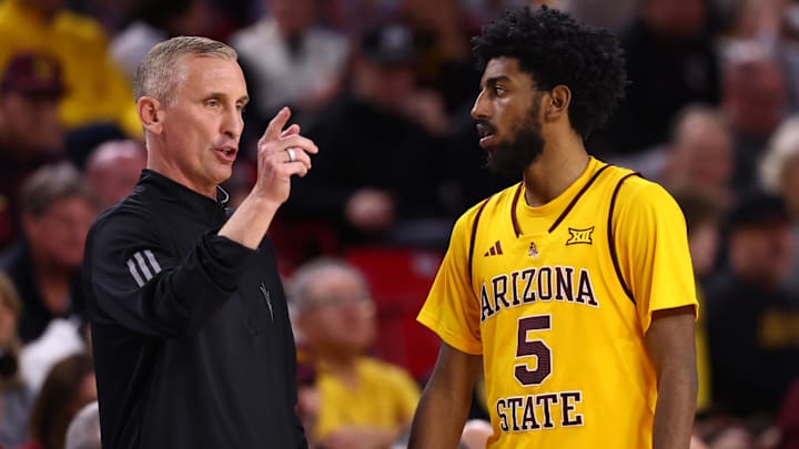 Jan 24, 2026; Tempe, Arizona, USA; Arizona State Sun Devils guard Maurice Odum (5) with head coach Bobby Hurley against the Cincinnati Bearcats in the second half at Desert Financial Arena. Mandatory Credit: Mark J. Rebilas-Imagn Images