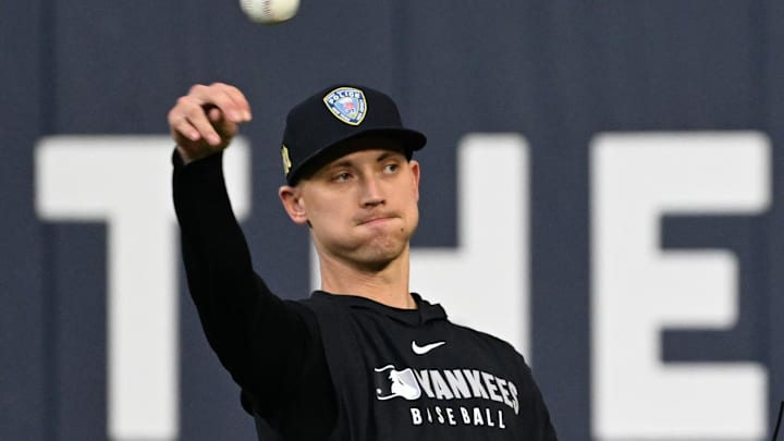 Oct 3, 2025; Toronto, Ontario, Canada; New York Yankees pitcher Luke Weaver (30) throws the ball during workouts at Rogers Centre. Mandatory Credit: Dan Hamilton-Imagn Images
