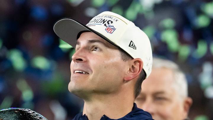 Seattle Seahawks head coach Mike Macdonald celebrates with the Vince Lombardi Trophy