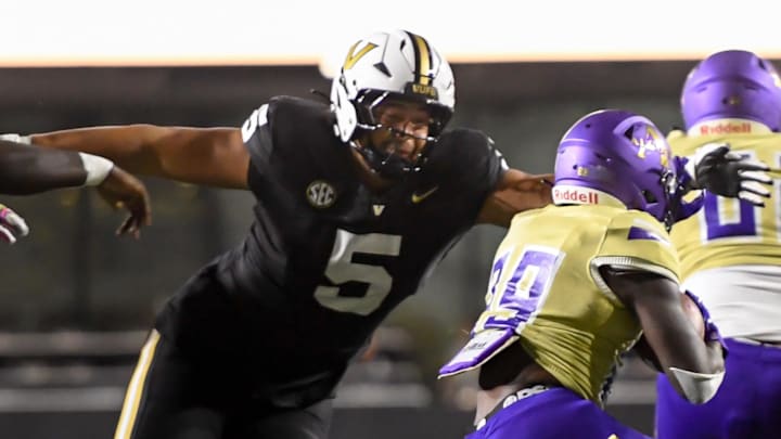 Vanderbilt Commodores defensive lineman Yilanan Ouattara (5) tackles Alcorn State Braves running back Cameron Stewart (29) for a loss during the second half at FirstBank Stadium.