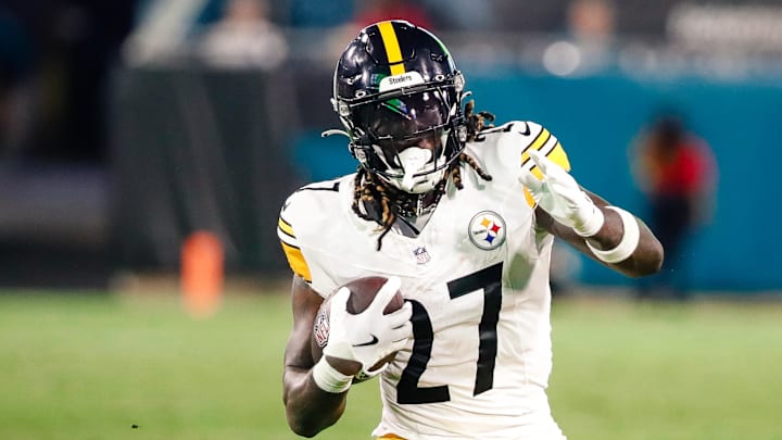 Aug 9, 2025; Jacksonville, Florida, USA; Pittsburgh Steelers running back Trey Sermon (27) carries the ball against the Jacksonville Jaguars during a preseason game at EverBank Stadium. Mandatory Credit: Travis Register-Imagn Images