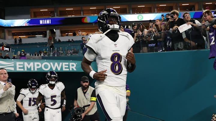 Oct 30, 2025; Miami Gardens, Florida, USA; Baltimore Ravens quarterback Lamar Jackson (8) warms up before a game against the Miami Dolphins at Hard Rock Stadium. Mandatory Credit: Nathan Ray Seebeck-Imagn Images