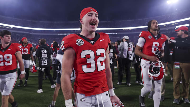 Nov 15, 2025; Athens, Georgia, USA; Georgia Bulldogs running back Cash Jones (32) celebrates after a game against the Texas Longhorns at Sanford Stadium. Mandatory Credit: Brett Davis-Imagn Images